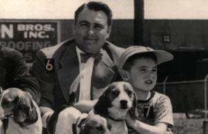 jim watson and tom watson with beagle puppies